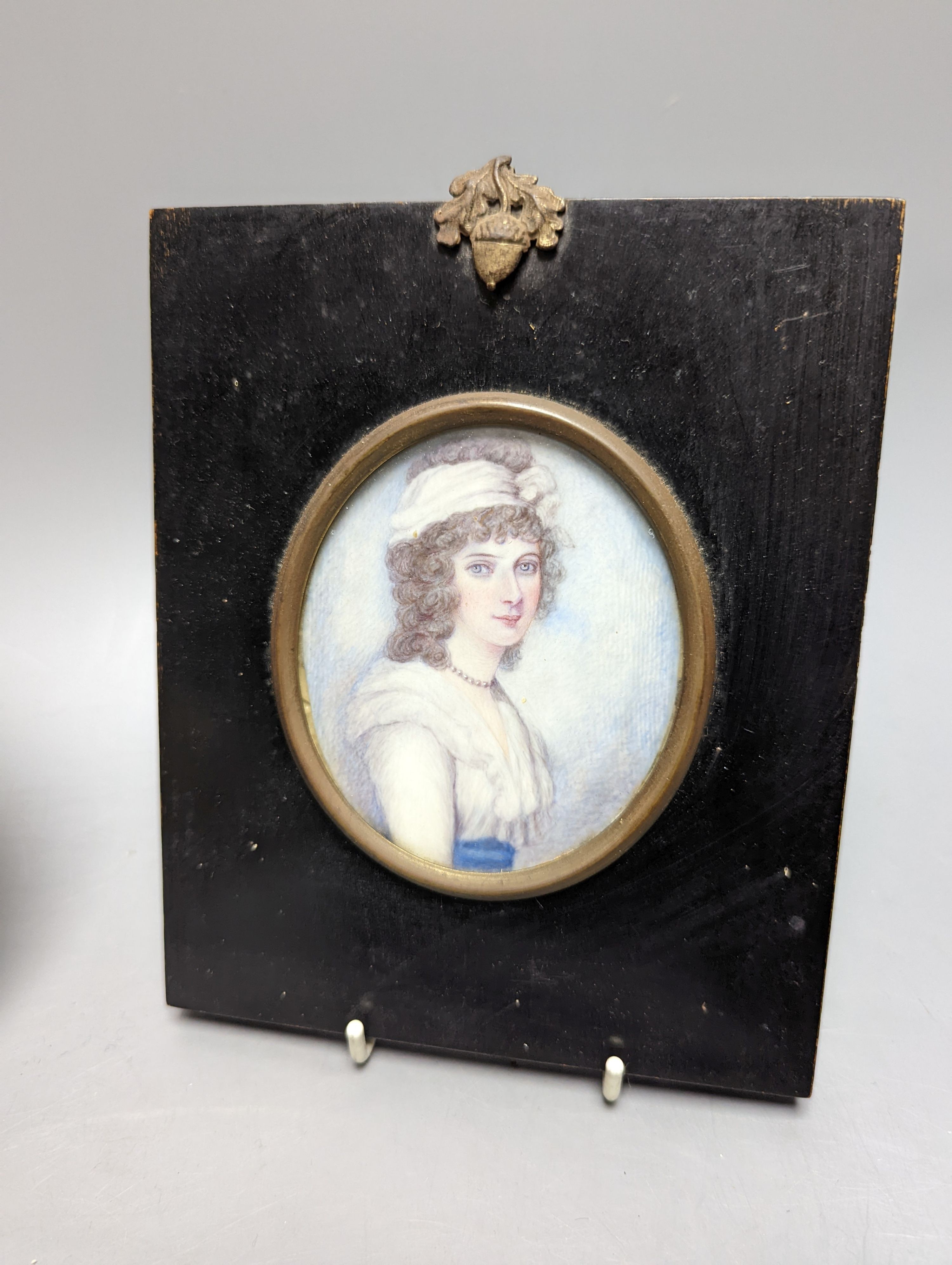 A plaster relief portrait, Samuel Pepys, frame 13cm., a Victorian portrait miniature on ivory, a silhouette portrait and a woven silk picture